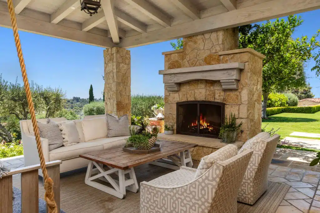 A spacious dining area featuring elegant decor, large windows for natural light, and contemporary furniture. The design focuses on comfort and style, creating a welcoming atmosphere.