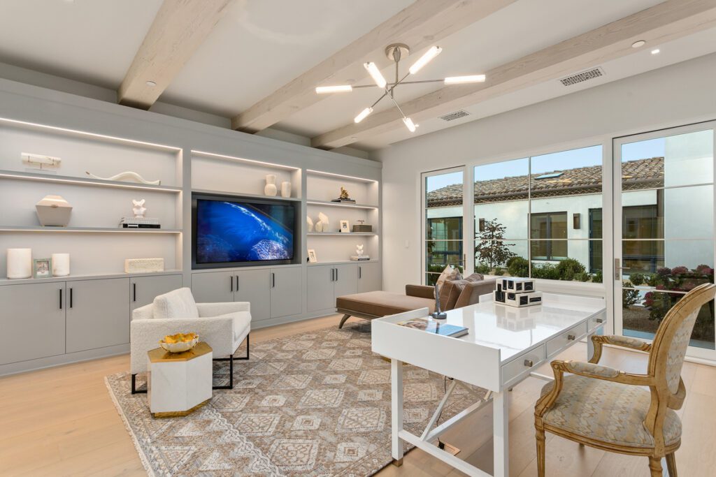 A chic dining room featuring a bright, airy ambiance. The space is enhanced with light fixtures and a modern aesthetic that creates a welcoming atmosphere for both casual and formal meals.