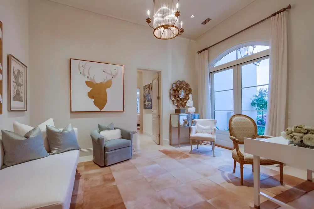 A stylish living room designed by Monalex, featuring modern furniture and minimalist decor. The space is designed for comfort and elegance, making it perfect for relaxation and entertainment.